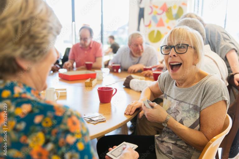 elderly ladies sitting and laughing